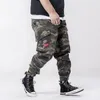Męskie spodnie Moda Casual Multi Kieszonkowa Bawełniana Outdoved Oversized Loose Camouflage Cargo Hip Hop