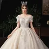 Luksusowe suknie balowe suknie ślubne Krótki rękawki z cekiny z ramiączki Aplikacje koronkowe arabskie suknie ślubne ślubne suknie ślubne kryształowe vestidos de novia