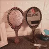 Hand vastgehouden make -upspiegel romantische vintage kanten spiegels ovaal ronde cosmetisch gereedschap dressoir cadeau dh9482