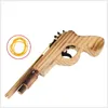 Drewniany gumowy zespół Bullet Pistolet Zabawki Model Launcher Fotografowanie Dla Dorosłych Dzieci Chłopcy Cosplay Rekwizyty