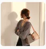 En kaliteli çanta cüzdan tasarımcıları moda kadınlar çanta çantaları çapraz kanatlı soho disko çantası saçaklı haberci debriyaj kamera çantası 22cm