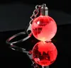 Clignotant Porte-clés Party Favor Led Rougeoyant Mini Verre Terre Boule Pendentif Porte-clés Creative Illuminé Vacances Sports Club Cadeau