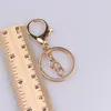 مفاتيح مفاتيح 5pcslot 333mm Zinc Alloykc GoldrhodiumColor Clasp Clasp Hook -keychain spriting keyyring for5907702