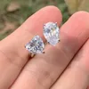 シンプルなファッション結婚指輪輝く高級ジュエリー925スターリングシルバーウォータードロップホワイトTopaz Czダイヤモンド開いた調節可能な女性の婚約バンドリングギフト