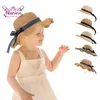 Nishine Moda per bambini Fatti a mano Maglieria estiva Cappellini per protezione solare Simpatico nastro Bowknot Spiaggia all'aperto Cappelli di paglia Copricapo per bambini Tesa larga