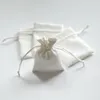 7 * 10cmの白い布のサンプルギフトパッキングバッグ巾着ジュエリーディスプレイのネックレスリングブレスレットイヤリング