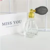 10ml Mini Glass Perfume Nebulizer Flaskor Gullig konisk kolv Förångareflaska med Atomizer Refillerbara flytande burkar 5PCSJars