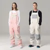 Pantaloni da sci Coppia tuta da sci antivento impermeabile indossabile tuta monopezzo colore esterno coordinato piedi abbigliamento espandibile