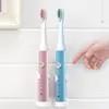 Brosse à dents électrique rechargeable USB Brosse à minuterie pour adulte IPX7 Brosses à dents réglables étanches à 5 modes avec têtes de rechange - Rose