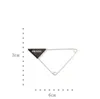 European and American niche inverted triangle letter brooch simple atmosphere versatile fashion suit sweater accessories unisex high quality fast delivery