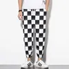 Odblaskowe spodnie Streetwear Mężczyźni Jogger Długość Harem Spodnie Splice Black White Lattice Joggers Spodnie Mężczyźni Spodnie Casual X0723