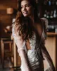 2021 Shiny Long Sleeve Wedding Dresses Mermaid Bridal Gowns Sexy Backless Appliques Lace Floral Beads Boho Beach Bride Dress