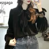 Ezgaga kvinnor blus velour outwear koreanska vår vintage spets upp bowknot elegant skjortor svart flare ärm mode blusas 210430