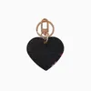 Брелок в форме сердца с пряжкой для влюбленных Автомобильный брелок из кожи ручной работы Дизайнерские брелки Мужчины Женщины Сумка Подвеска Аксессуары209f