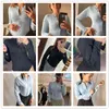 CNYISHE Mode Casual Bouton Barboteuses Femmes Combinaisons Hiver À Manches Longues O-cou Côtelé Skinny Combinaisons Streetwear Body Top 210401