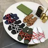 2021 Luxe Nieuwe Vrouwen Slippers Strepen Kruis Ontwerp Platte Slippers Zomer Streetwear Galvaniseren Hardware Letter G Gesp Dames schoenen 5 Coloes