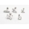 50pcs expédition corps Piercing bijoux-brillant CZ fleur/croix/coeur femmes boucle d'oreille clous d'oreille Helix Cartilage barre mélange