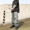 Pantaloni da uomo con stampa teschio con foro jeans dritti vintage pantaloni da donna maschili streetwear pantaloni harem in denim casual larghi hip-hop pantaloni Harajuku da uomo