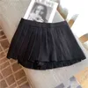 Svart preppy stil kjol för kvinnor hög midja minimalistisk avslappnad pläterad mini kjolar kvinnlig sommar mode 210521