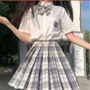 女子高生女性のJKスカート日本のプリーツユニフォーム2ピースドレスハイウエストAラインチェック柄スカート韓国のプレッピースタイル夏の弓シャツの女性のフルセット