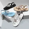 女性サンダル2021ブランドファッションビーチレザーフラットサンダル女性夏の靴高級デザイナー女性のためのサンダル