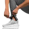 Herrbyxor Män Casual Elastic Mens Fitness Workout 2022 Hip Hop Harem Jogging Sweatpants Byxor Unika Zipper M-3XL