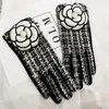 Guantes de cinco dedos Diseñador de la marca Invierno Cálido Más Terciopelo Espesar Pantalla táctil Cachemira Mitones Rejilla Flor grande para mujeresinvierno321d