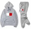 Lyxiga män sweatsuit märke designer tracksuit hoodie sweatshirts svart vit höst vinter jogger sport kostym kvinnor svett tracksuits set