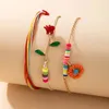 Braccialetti di perline colorate per le donne Graziosi fiori di rosa Corda fatta a mano Regalo di gioielli bohémien regolabile 3 pezzi/set