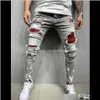 Herenkleding kleding drop levering 2021 mannen gescheurde skinny jeans hoge kwaliteit zwarte patchwork biker potlood locomotief denim broek straten hip