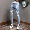 Estilo coreano moda homens jeans retrô luz azul elástico algodão rasgado streetwear impresso designer hip hop lápis pants mjo1
