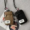 여름 새로운 디자이너 여성의 끈 휴대 전화 가방 지갑 나일론 방수 저장 가방 스페인어 스타일