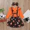 子供服セット女の子ハロウィーン衣装子供飛んでいるスリーブカボチャトップス+頭蓋骨プリントストラップドレス+弓ヘッドバンド3pcs /セット春秋の赤ん坊の服