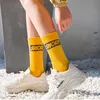 Calzini da uomo e da donna in cotone moda con lettera coppie originali unisex hiphop divertente streetwear sportivo traspirante skateboard Sox Trendy241u