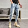 Moda Streetwear homens jeans retro luz azul elástico algodão de algodão retalhos bordados desenhista calças punk hop pants calças rasgadas