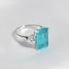 オヴァス100％925スターリングシルバーParaiba Tourmaline Gemstoneリングのための女性輝く高炭素ダイヤモンドの結婚式ファインジュエリー220222