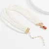 Colliers pendentifs de bijoux rouges concepteurs légers luxueux de tempérament simple imitation de la chaîne de perle de perle mawée multicouche BE5688508
