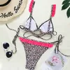 Ny sexig bikini 2021 Leopard baddräkt Kvinnor Ruffle Tie Side Push Up Bikini High Cut badkläder Kvinnor Triangel Suit Swimsuit 210319