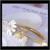 ブレスレットドロップ配達2021高級デザイナー女性ブレスレットホワイトデイジーバングル銅と金メッキエレガントな花のイヤ​​リングチョーカージュエリー