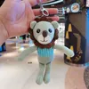 20cm schattige leeuw pluche speelgoed cartoon pop schooltas hanger sleutelhanger kinderen knuffels speelgoed hangers groothandel