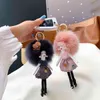 Echte vossenbont pompom pluizige pop sleutelhanger rugzak baby geschenken zacht speelgoed met hanger sleutel portemonnee tassen hanger voor meisje vrouwen kinderen