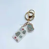 Keychains Bear key chain Korean girl heart cartoon pendant student schoolbag creative simple headset set ring