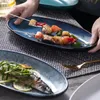Plats plaques céramique japonais poisson assiette créative personnalité simple personnalité ménage végétal profonde ovale sushi micro-ondes PLA cuite à la vapeur