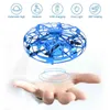 Mini UFO Drone RC Вертолет Самолет игрушки Quadcopter Инфракрасный ручной Sensing Интерактивная Летающие блюдца игрушки Золотой / красный / синий 211104