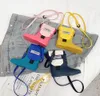Женщины 039S Плековая сумка модные дождевые ботинки Дизайн силиконовой мягкая текстура мобильный телефон мини -кросс кубик желтый синий красный 5081388387
