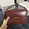 5A Fashion temperament teen Triumph Shoulder Bag Top quality leather Bracket Angled luxury Designer bag Fashion Camera Handbag