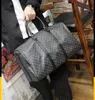 Lyxkvinnor män resande väska designer läder tote stor storlek axelväskor mode crossbody väskor dam koppling och handväska sport handväskor pojkar flickor plånböcker