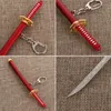 Keychains 1pcs Unisexe Anime Metal Alliage Zoro Katana Buckle Modèle Sabre Samurai Sword Keychain Scabbard Key Bague Cadeau