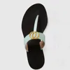 Män strand tofflor sommarkvinna sko glider brev platt häl designer skor 100% läder sandaler metallknapp lata lady loafers flip flops stor storlek 35-42-44-45 med låda