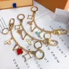 Lüks Tasarımcı Keychain Moda Klasik Marka Anahtar Tokalı Çiçek Mektubu Anahtar Zinciri El Yapımı Altın Anahtarlıklar Erkek Kadın Çanta Kolye 8nj4